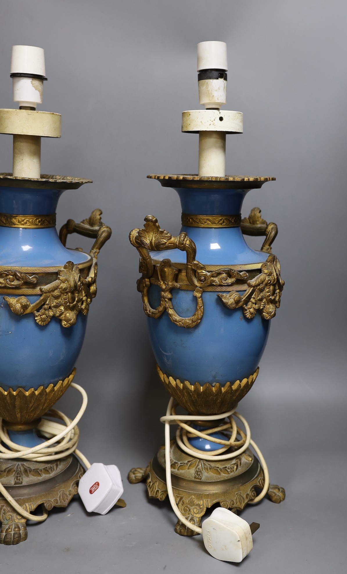 A pair of Sevres -style porcelain ormolu mounted table lamps. 50cm tall